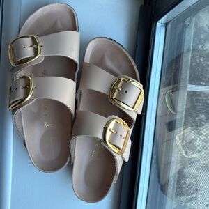 Birkenstocks gold buckle